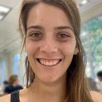 Photo of Darian smiling at the camera.