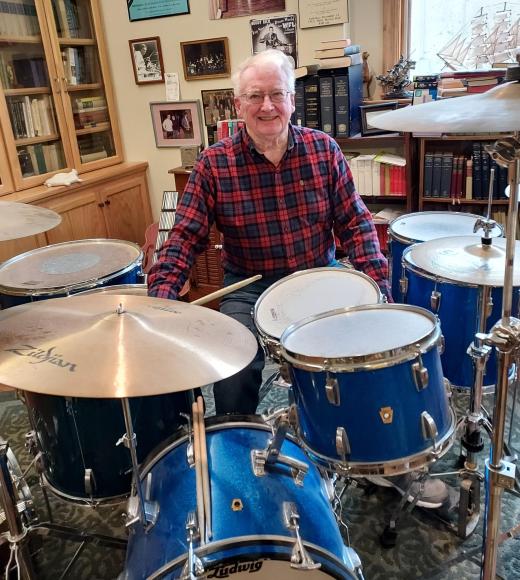 Winder McConnell behind a drum set