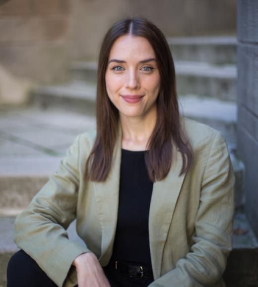 A woman smiling at the camera