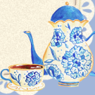 a white teapot and cup with blue floral accents.